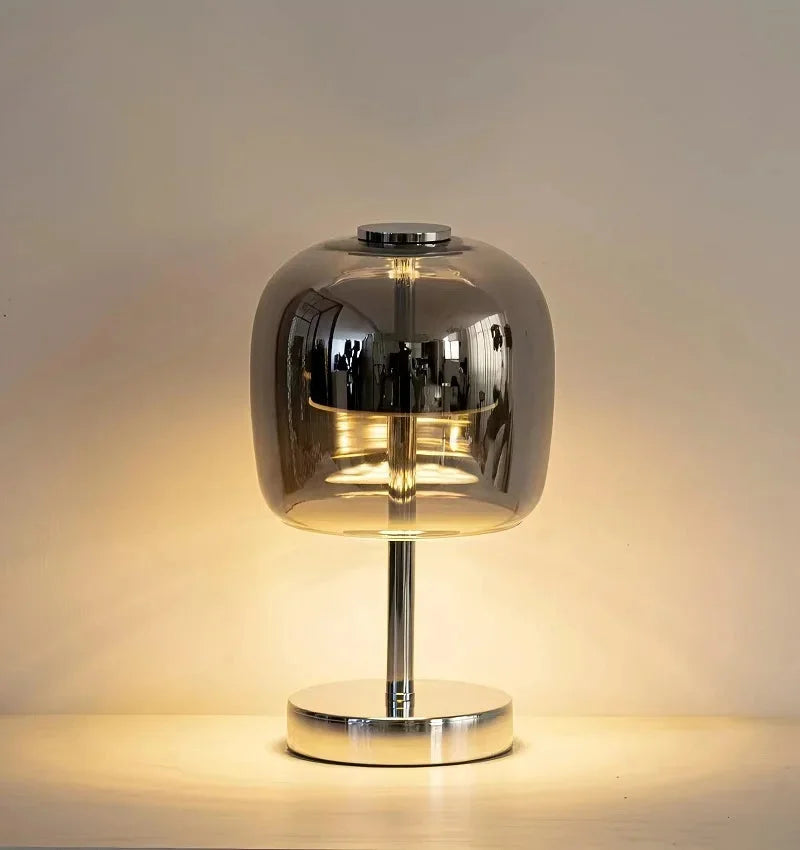 Smoked glass table lamp and pendant light with modern design and elegant finish