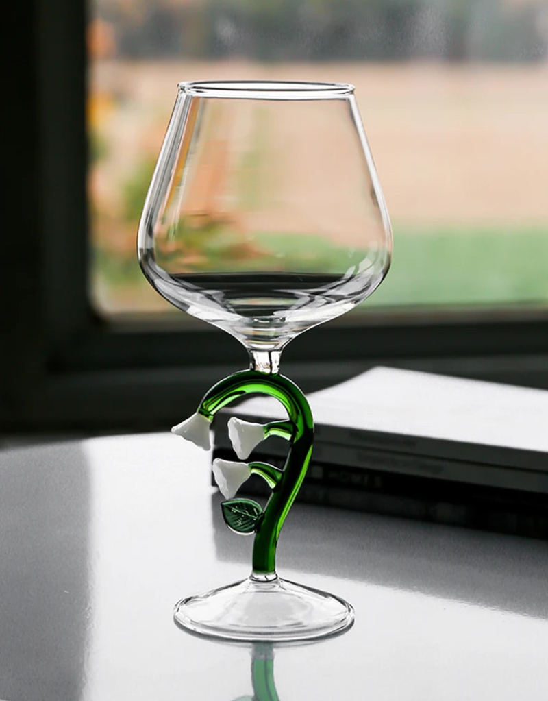 Wine glass with whimsical nature-inspired stems