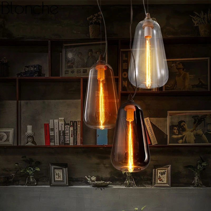 artisan hand-blown glass pendant lights with exposed filament bulbs