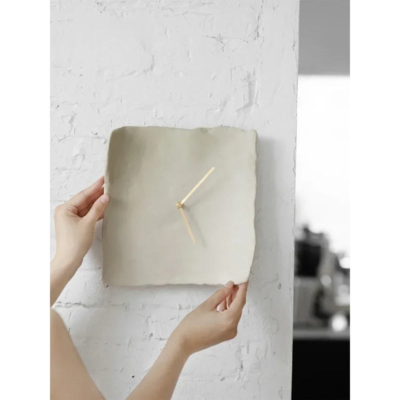 minimalist resin wall clock in textured matte finish