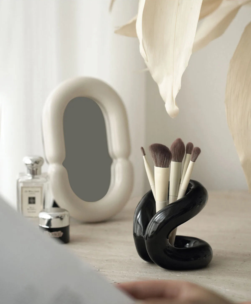 sculpted knot ceramic holder for vanity, bathroom and home decor