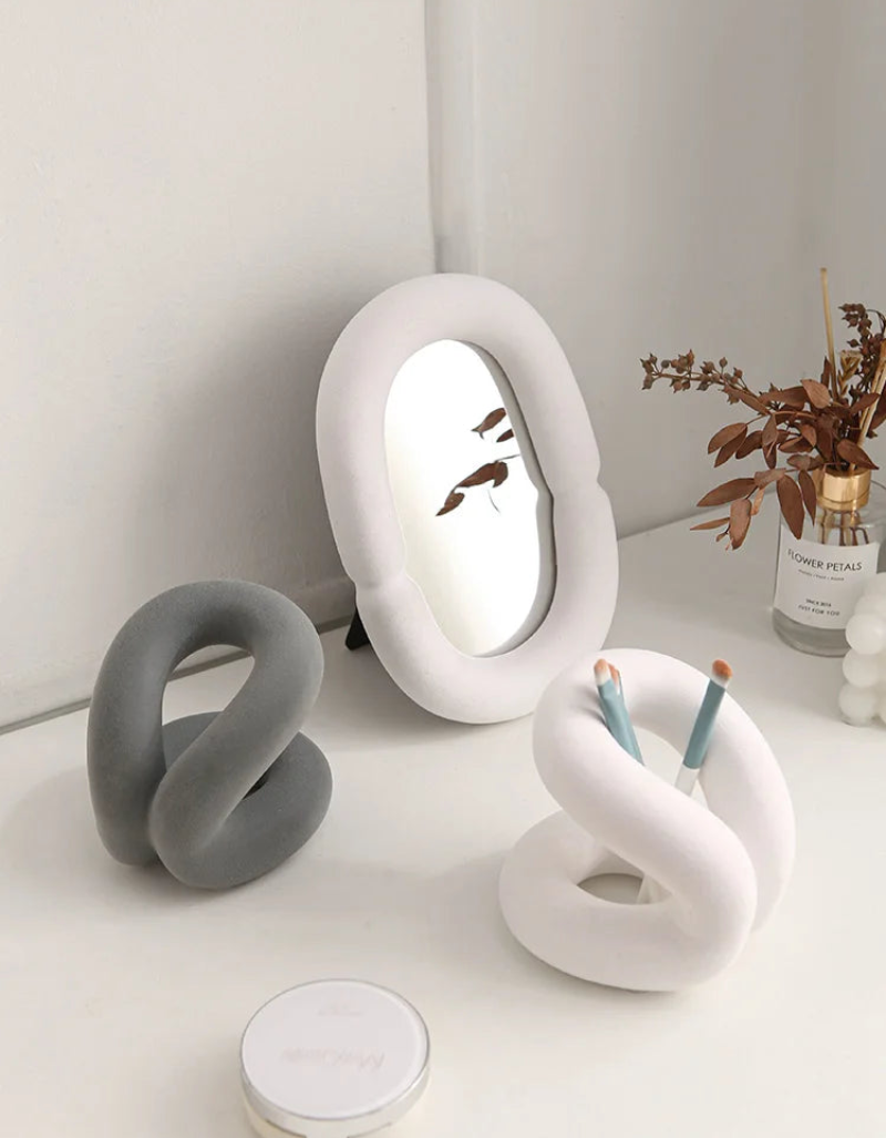 sculpted knot ceramic holder for vanity, bathroom and home decor