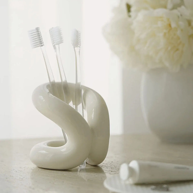 sculpted knot ceramic holder for vanity, bathroom and home decor