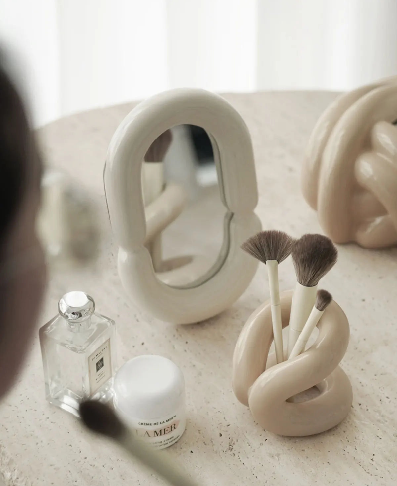 sculpted knot ceramic holder for vanity, bathroom and home decor