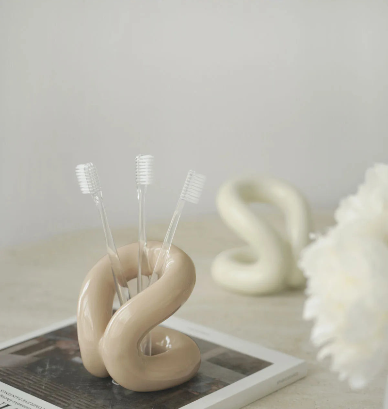 sculpted knot ceramic holder for vanity, bathroom and home decor