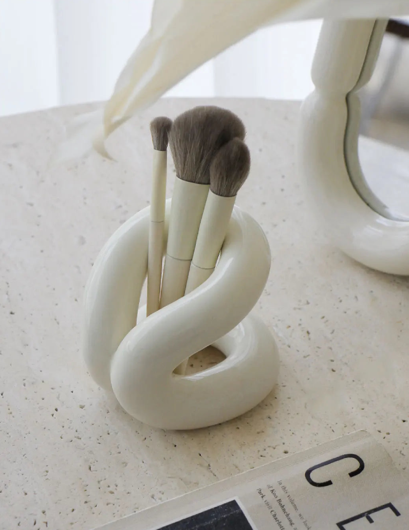 sculpted knot ceramic holder for vanity, bathroom and home decor