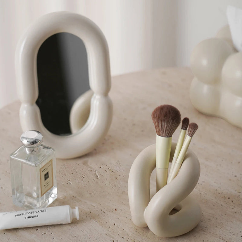 sculpted knot ceramic holder for vanity, bathroom and home decor