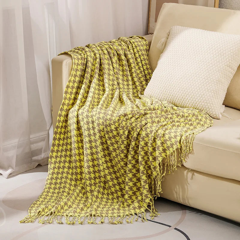 Vintage geometric knitted throw blanket with tassels in houndstooth and grid patterns