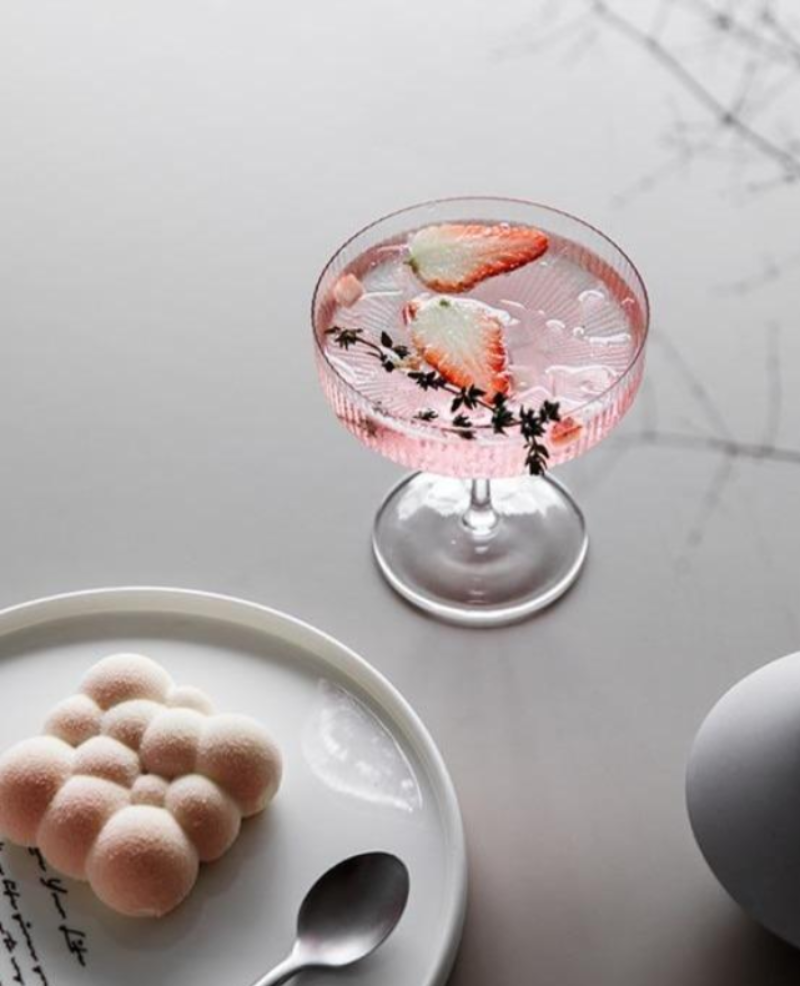 round textured champagne and cocktail glass