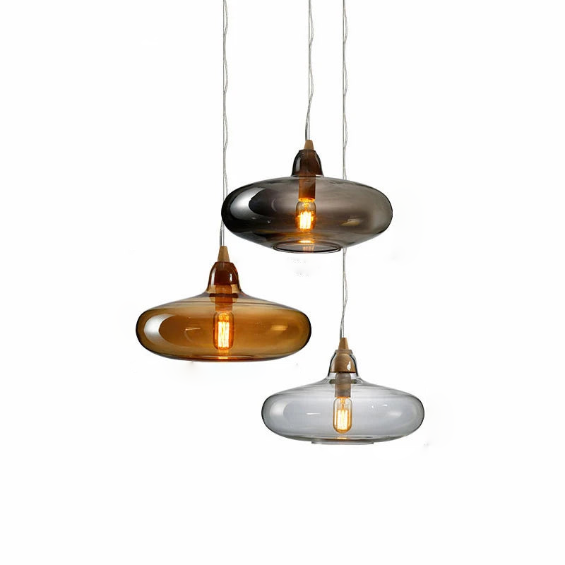 artisan hand-blown glass pendant lights with exposed filament bulbs