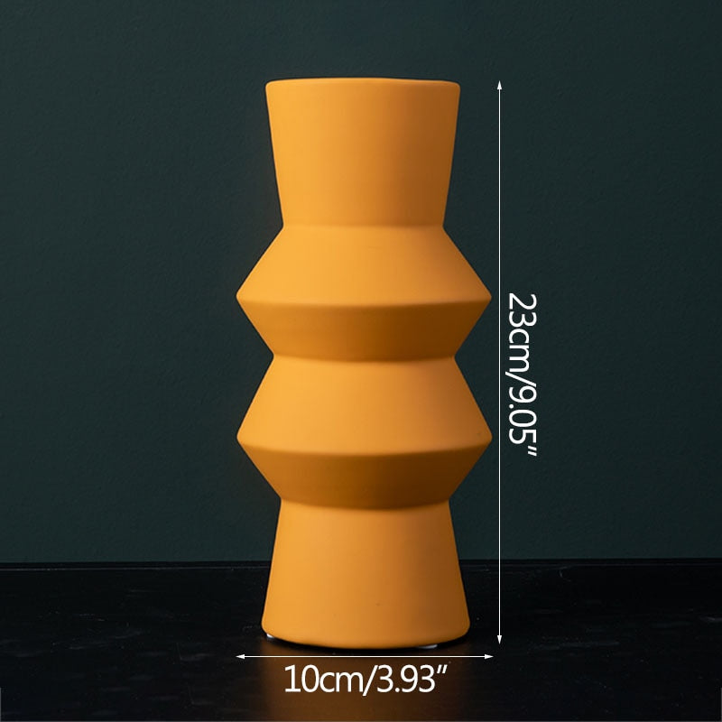 sculptured cylinder orange ceramic vase