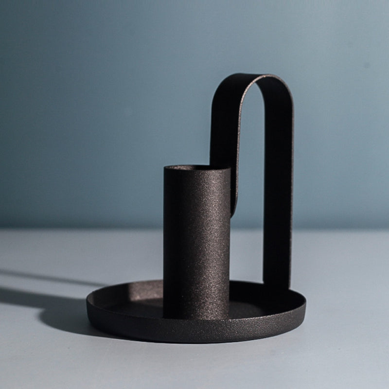 round black candlestick holder