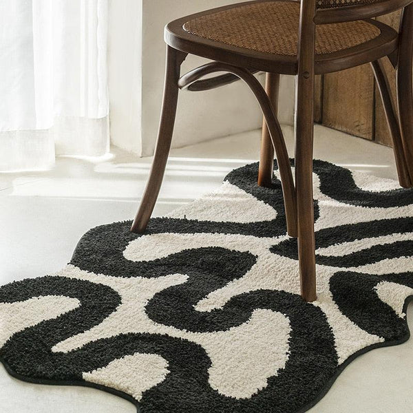 Black Swirl Shaped Area Rug