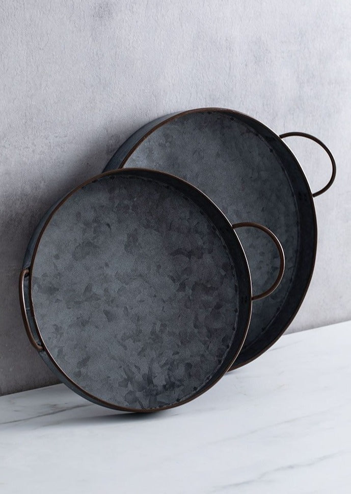 round black casted iron tray