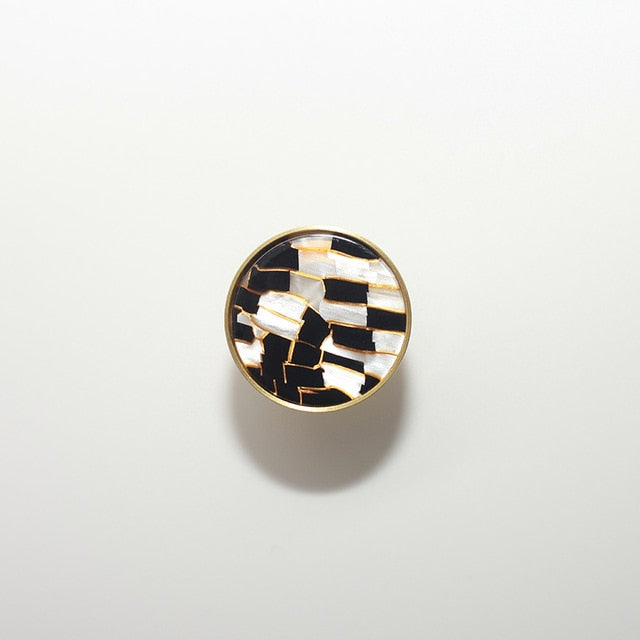 round color marbled brass cabinet knob and pulls