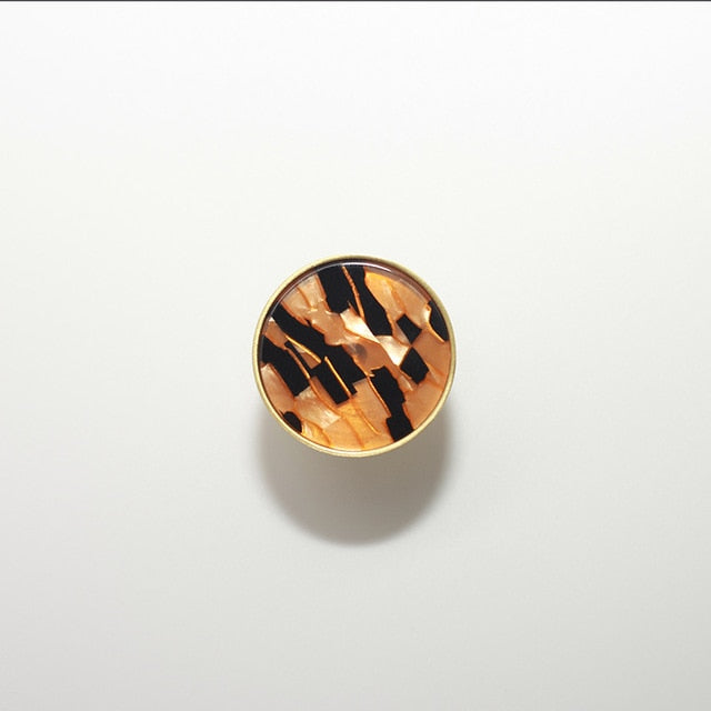 round color marbled brass cabinet knob and pulls