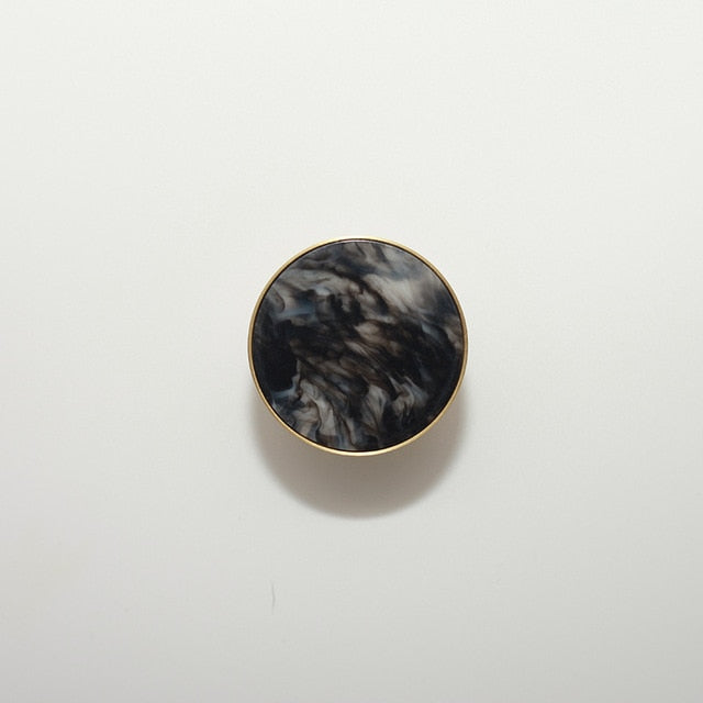 round color marbled brass cabinet knob and pulls