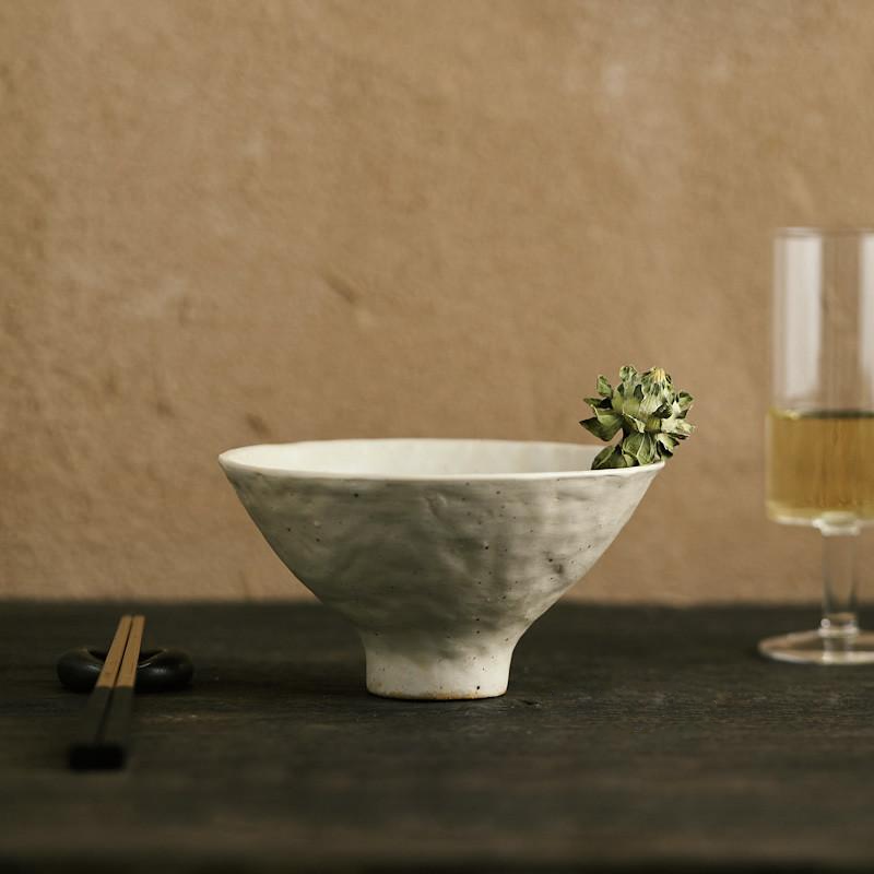 abstract round stone textured white ceramic bowl