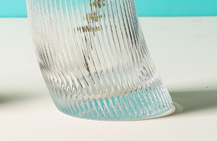 curved water or cocktail glass