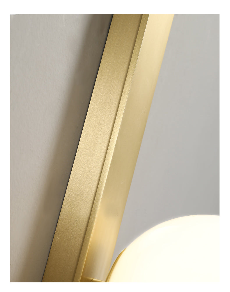 On the Edge Brass & Globe Wall Lamp