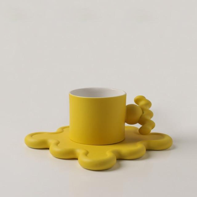 Handmade Easy Grip Ceramic Cup and Saucer Yellow