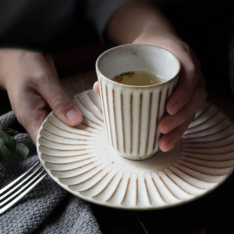 round scalloped textured body ashy white ceramic cup