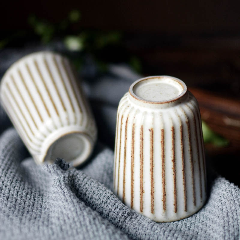 round scalloped textured body ashy white ceramic cup