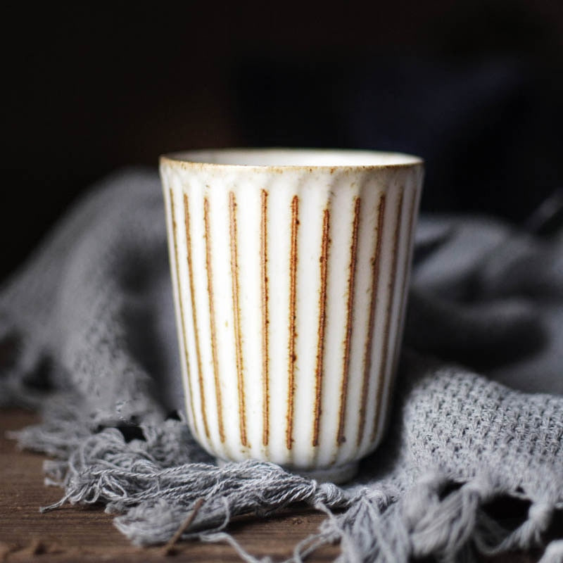 round scalloped textured body ashy white ceramic cup