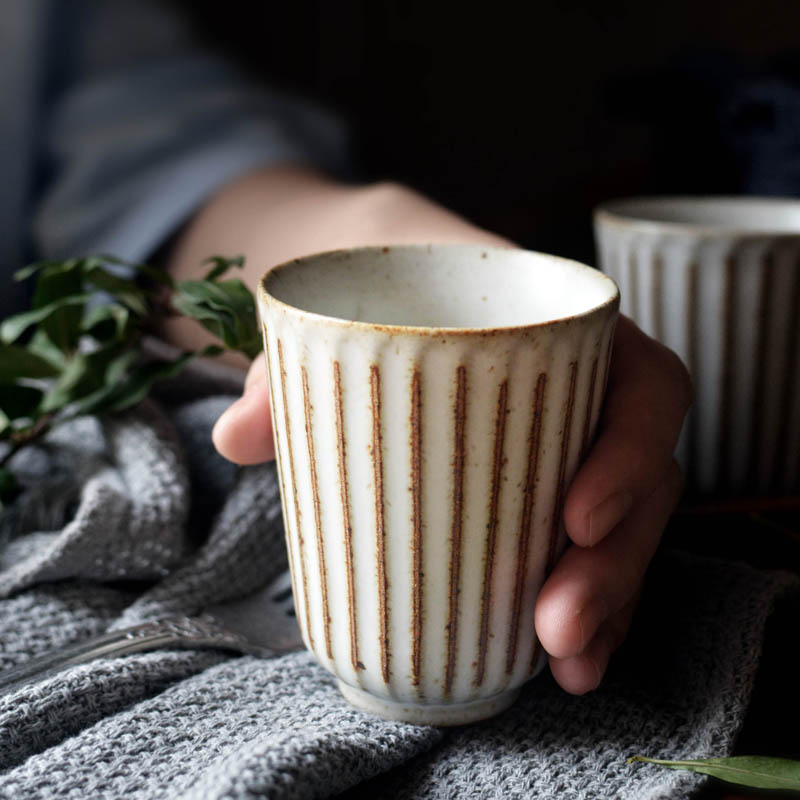 round scalloped textured body ashy white ceramic cup