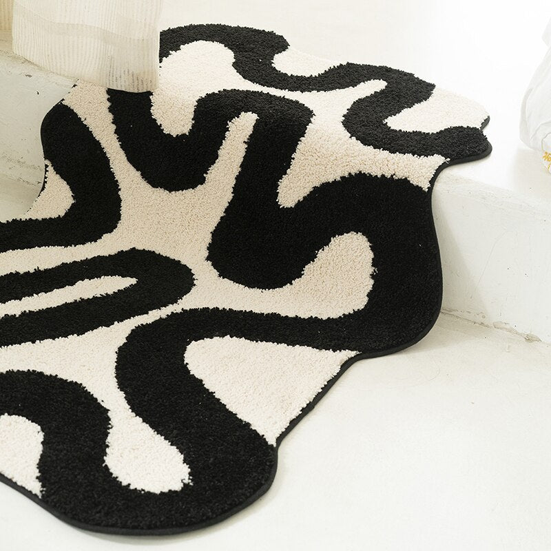 Black Swirl Shaped Area Rug