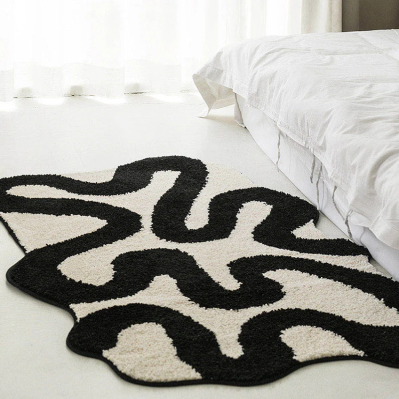 Black Swirl Shaped Area Rug