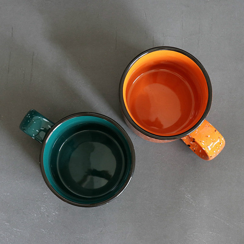 paint splatter ceramic mug orange green