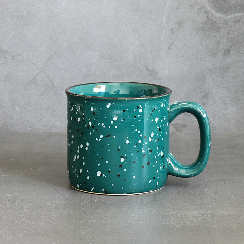 paint splatter ceramic mug orange green