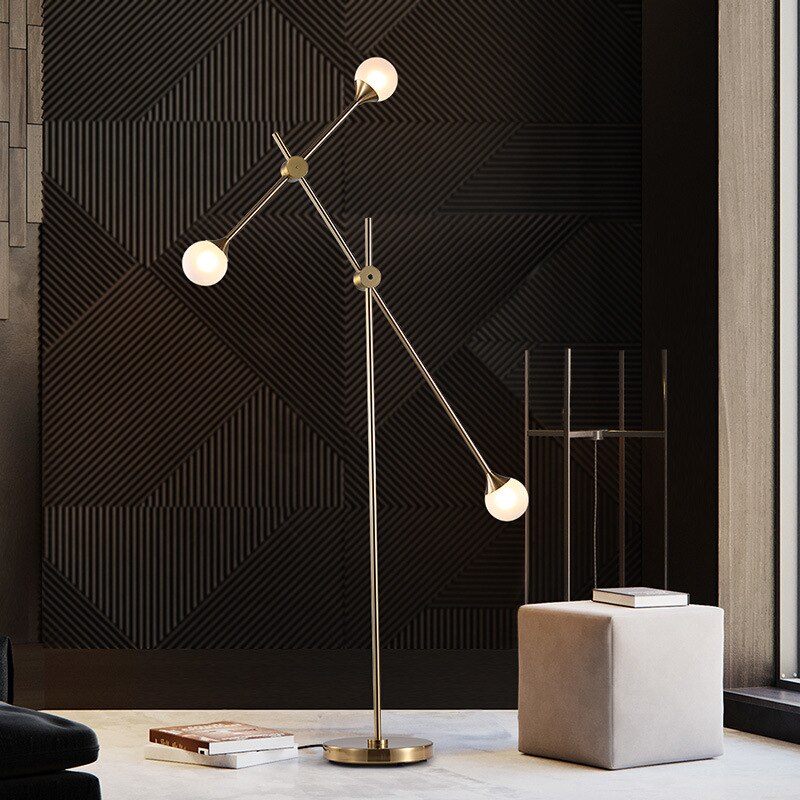 Three Bulb Dynamic Floor Lamp in Brass