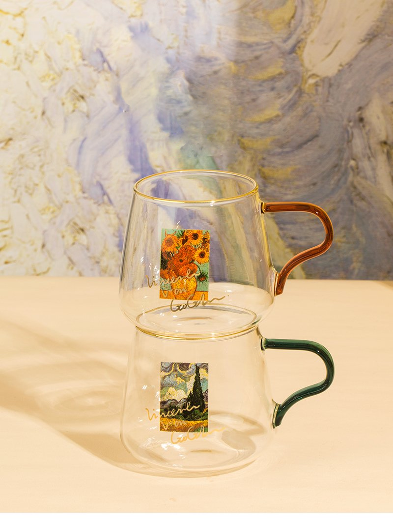 rounded clear glass van gogh-design mug with orange green handle