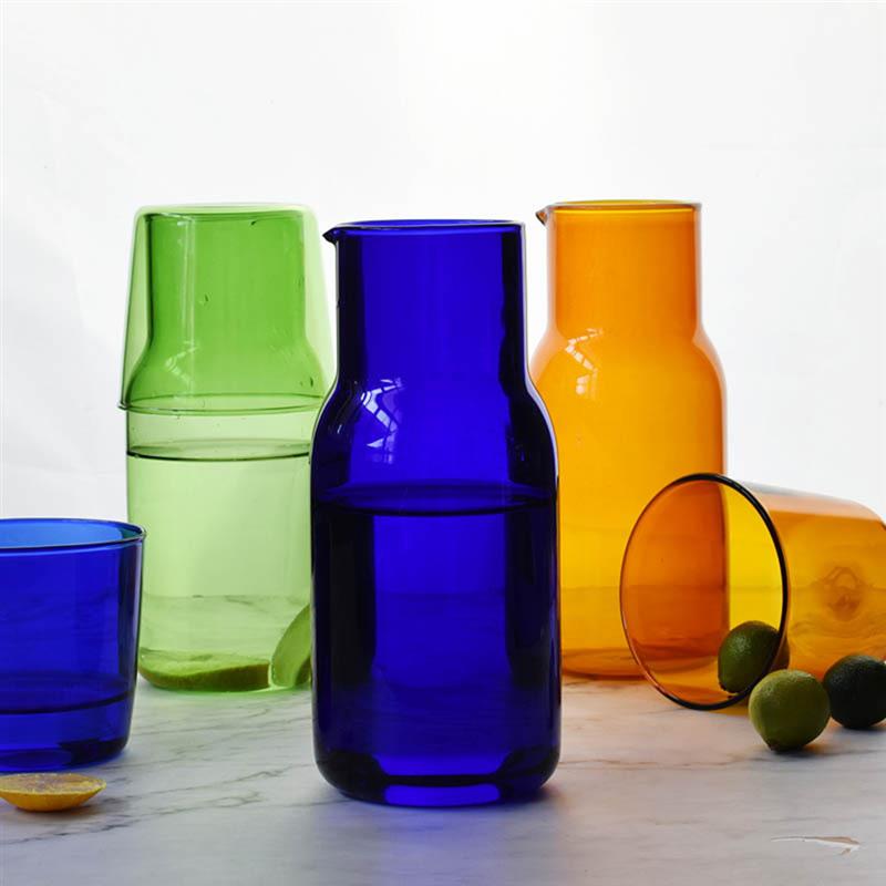 vibrant colored glass water jar and cup