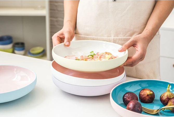 Yellow, lilac and pink deep porcelain plates