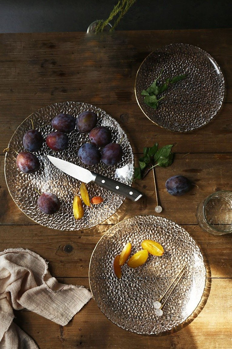 round textured hammered glass plate with gold trimming