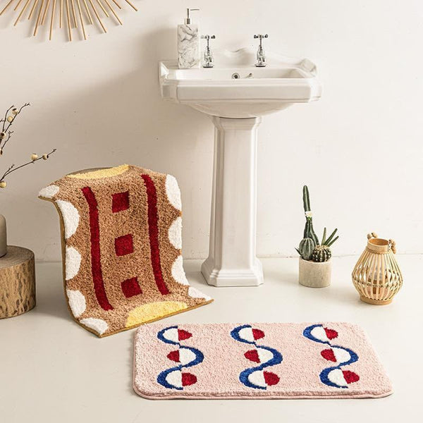 bath mat geometric soft blush and brown red ivory yellow blue