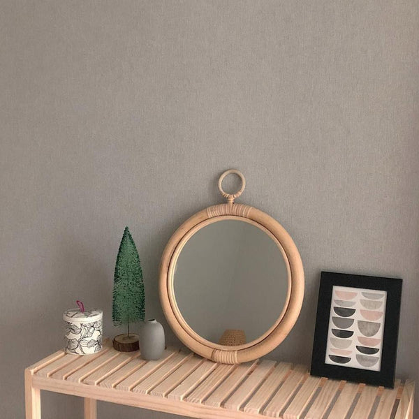 round vintage rattan mirror