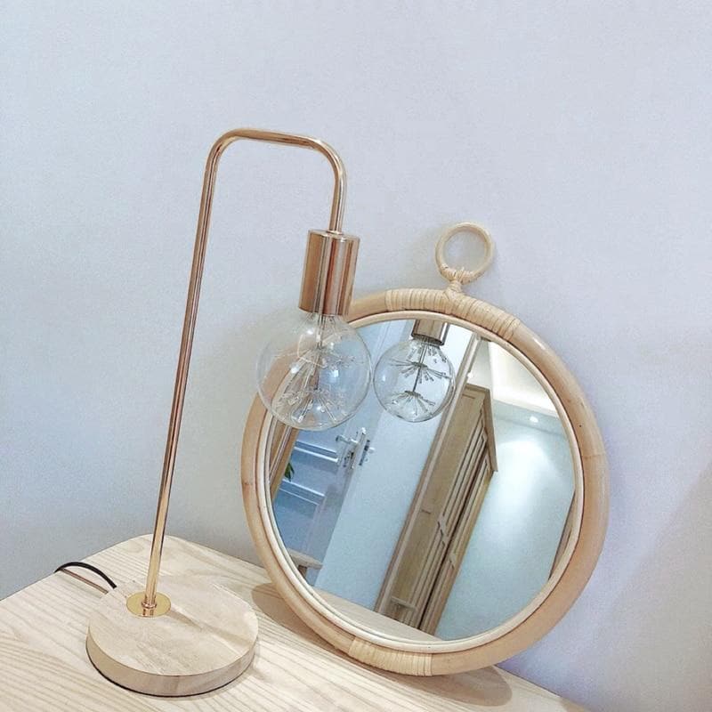 round vintage rattan mirror