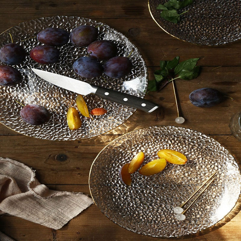 round textured hammered glass plate with gold trimming