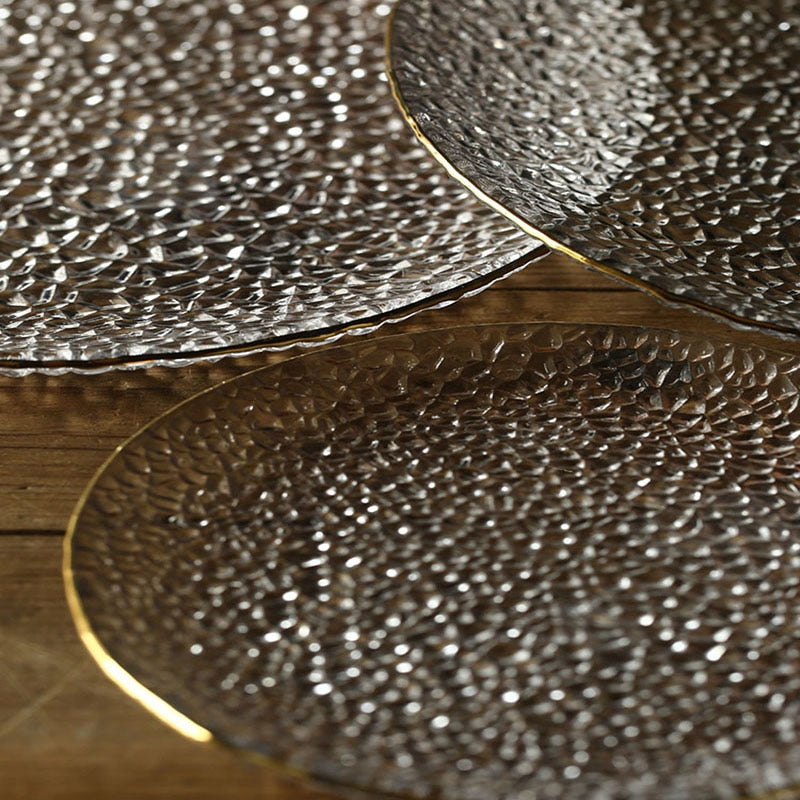 round textured hammered glass plate with gold trimming