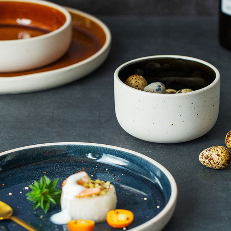 round orange blue ceramic plate and bowl