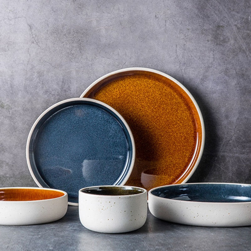 round orange blue ceramic plate and bowl