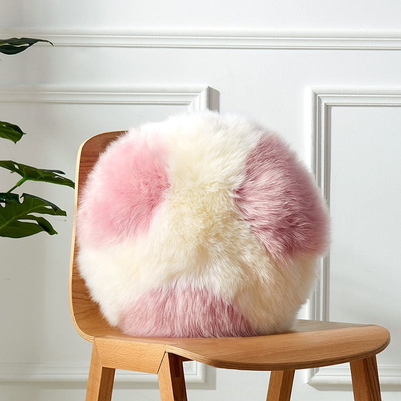 round pink and white wool sheepskin fur pillow