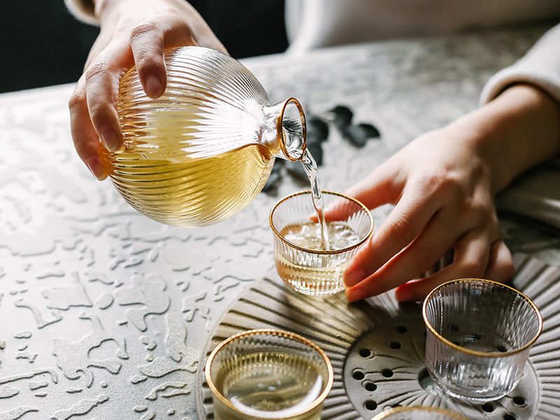 round textured vertical stripe with gold mouth trimming sake pot and cups