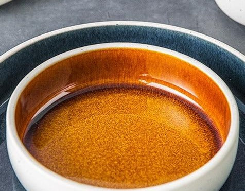 round orange blue ceramic plate and bowl