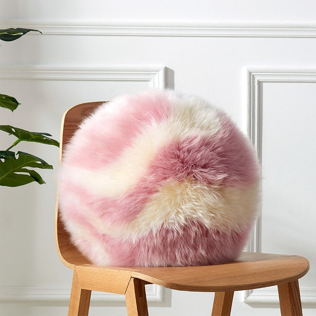 round pink and white wool sheepskin fur pillow