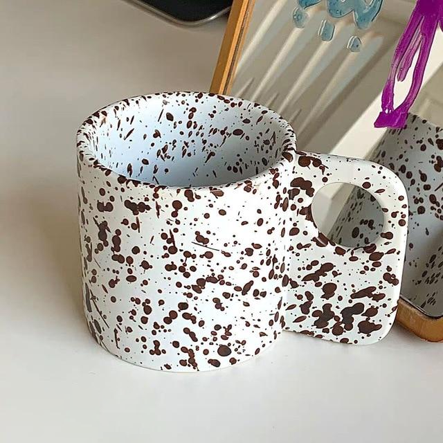 rounded splashed ink ceramic mug with handle